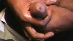 Butch looking black guy takes out his meat and jerks it until he cums